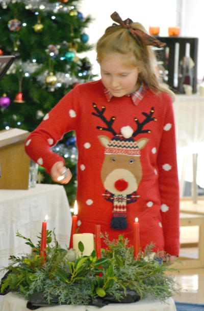 Lighting the candles on Christmas morning