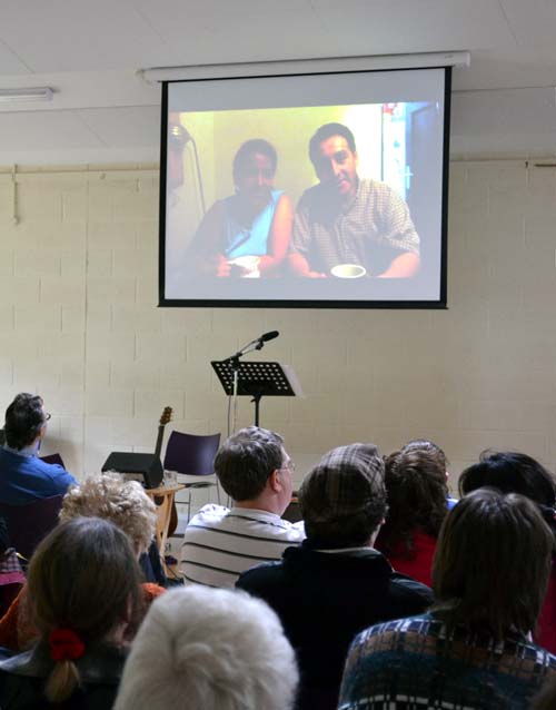 Christ Church members watching a video message on the giant screen