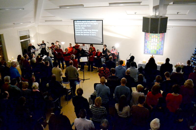 A choir leading a Carol service