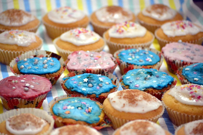 A tray of iced cup cakes