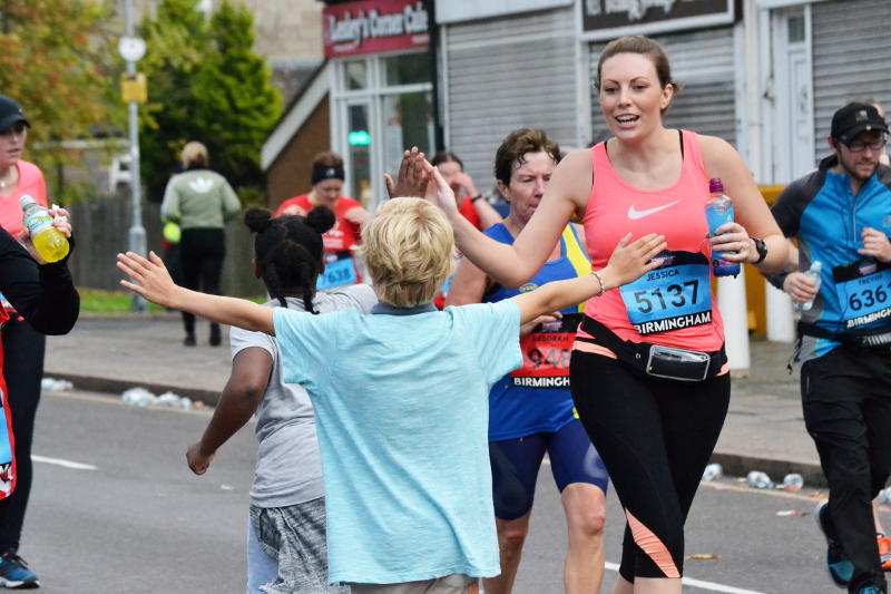 Waiting for a high-five in the Birmingham Marathon