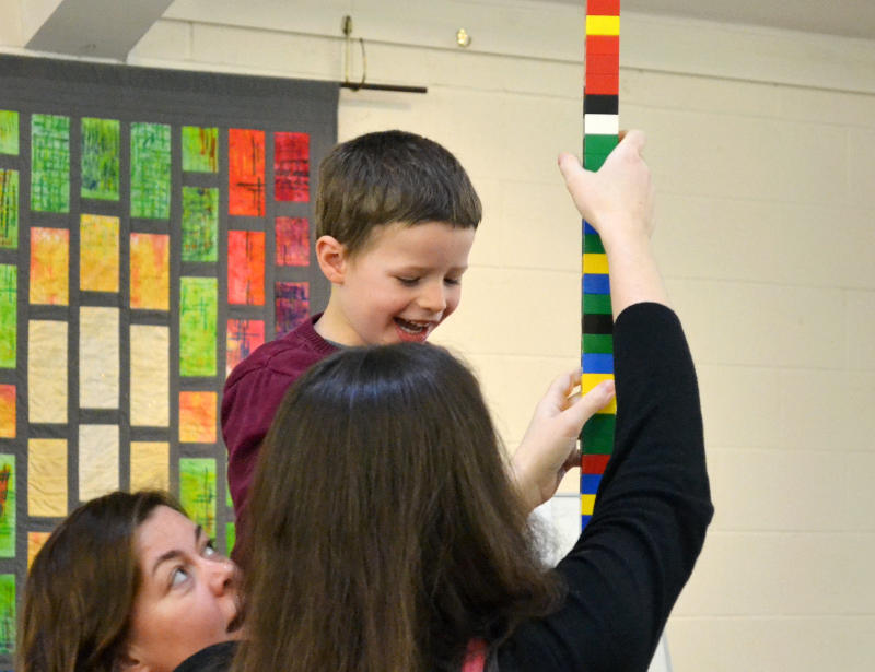 Building a tower of Lego bricks